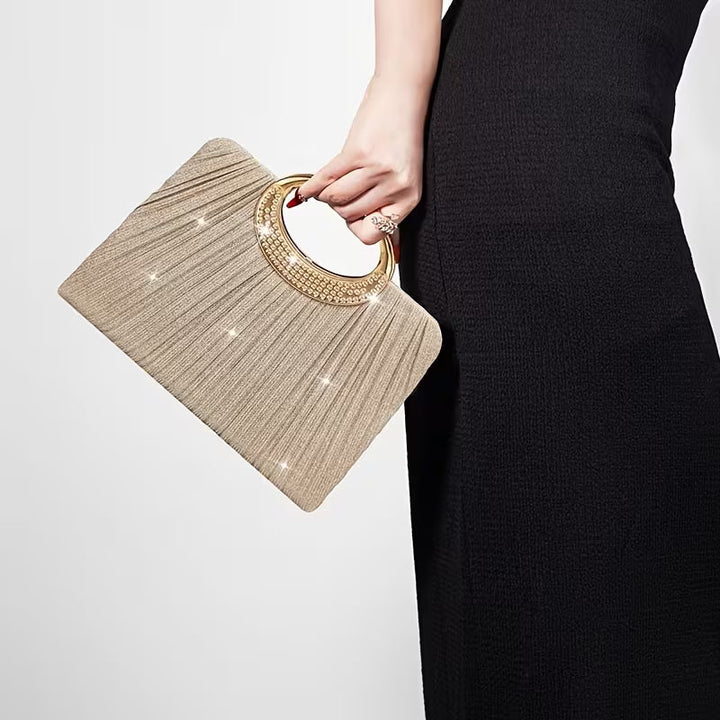Lizzana – Glänzende, Runde, Plissierte Handtasche Mit Ringverschluss