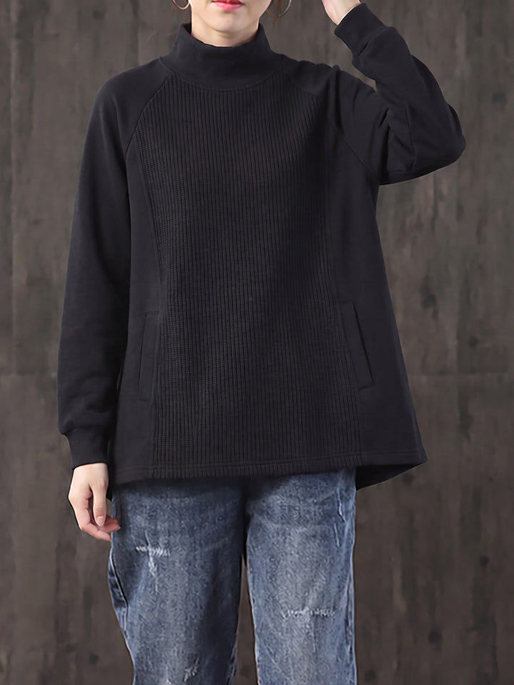 Safia – Oversize Bluse mit Rollkragen
